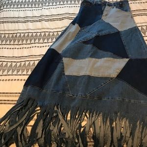 Very cute Long patch jeans skirt its a must have for the summer